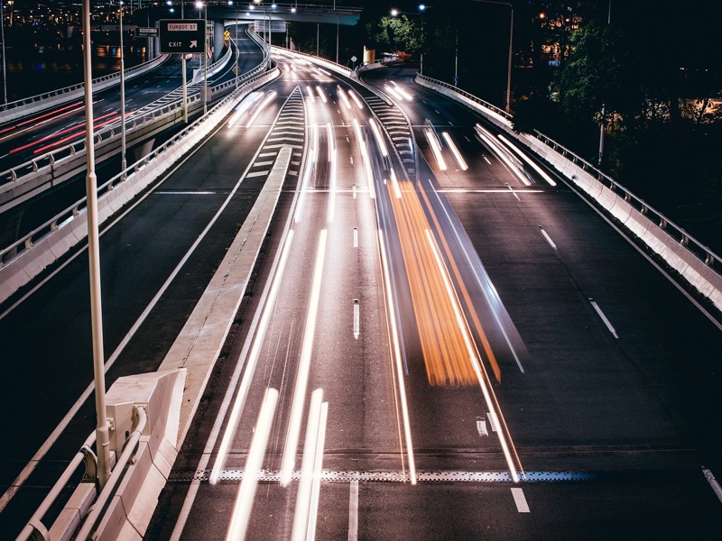 An empty highway at night.