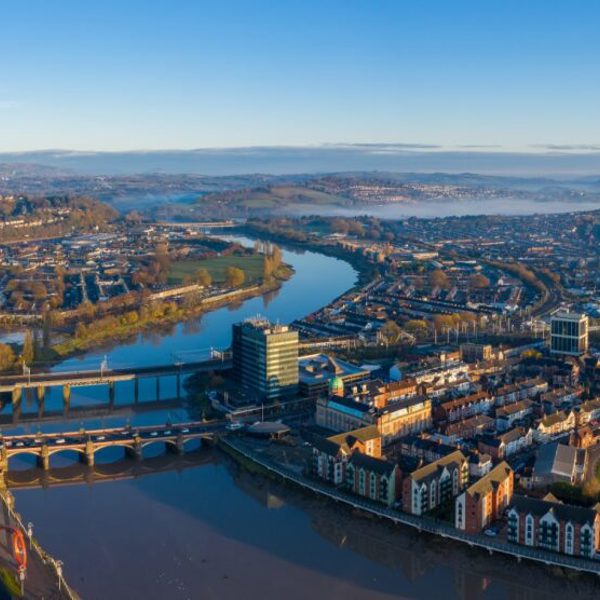 Cityscape with a bridge over a wide river