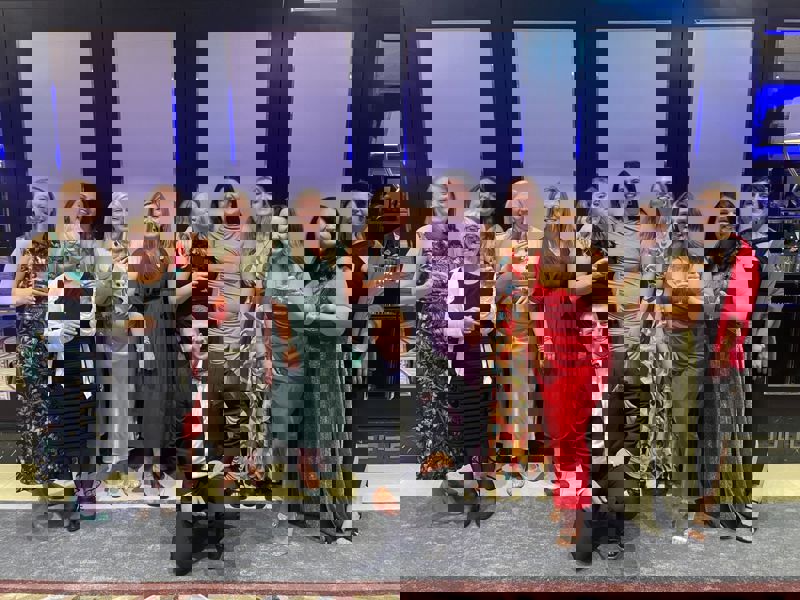 A group of people celebrating 