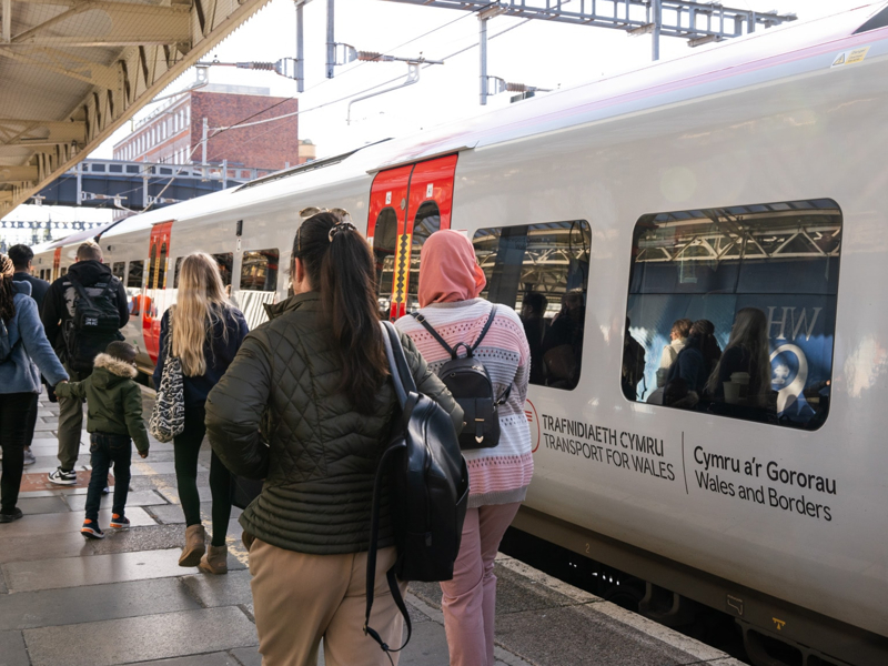 Image of passengers waiting for train