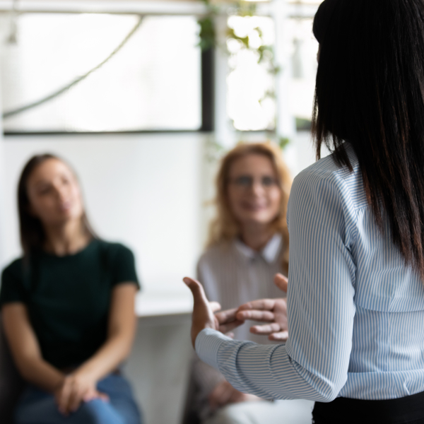 Image of woman presenting to young people
