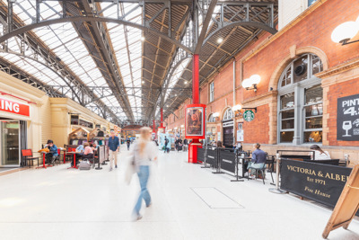 Image of people walking in train station
