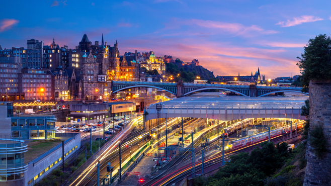 Cityscape with roads, rail and buildings