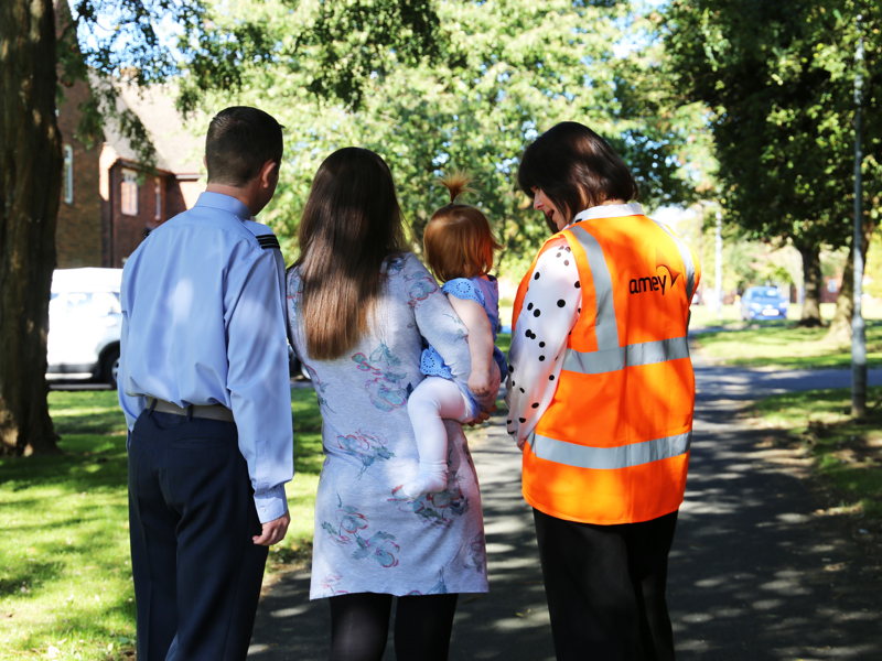 A photo of a family form behind.