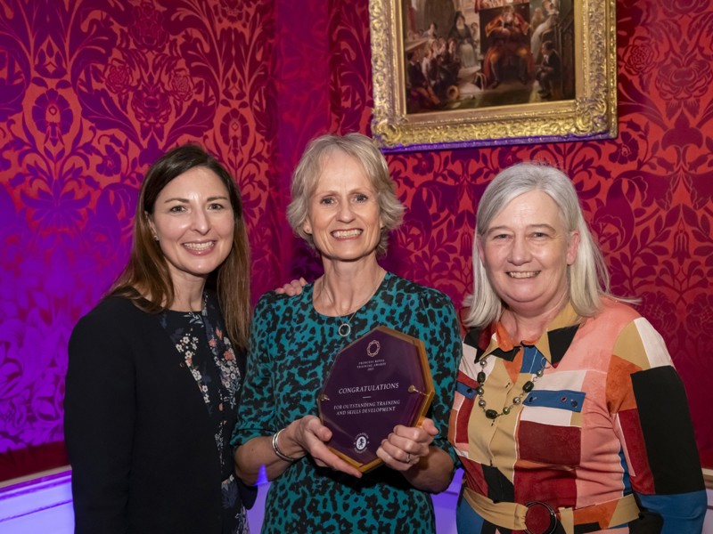 Picture of Louise Ramos with her award.