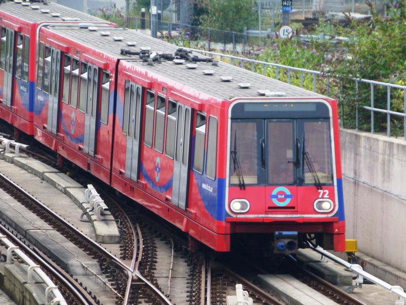 Image of a train traveling down a track.