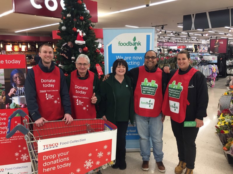 Image of Amey employees helping at Tesco's foodbank.