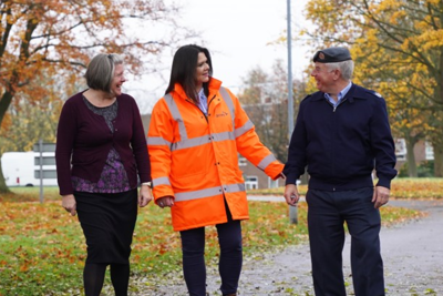Image of military personnel and an Amey employee