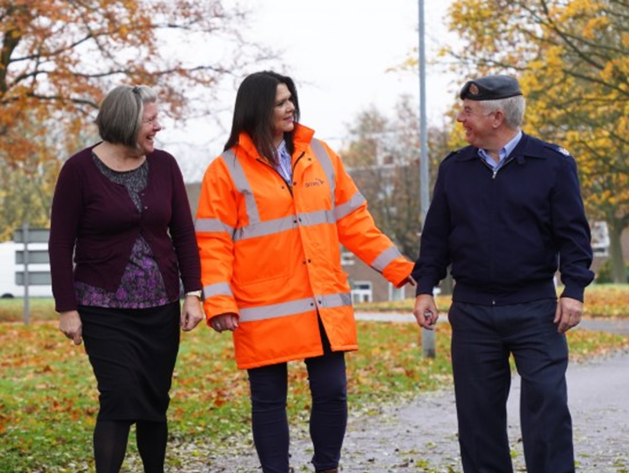 Image of military personnel and an Amey employee