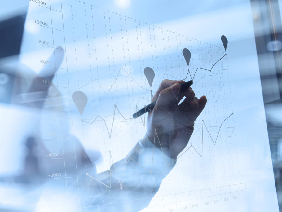 Image of graphic charts being written on a board.