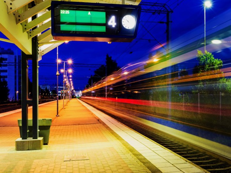 Image of a departures board on a train platform