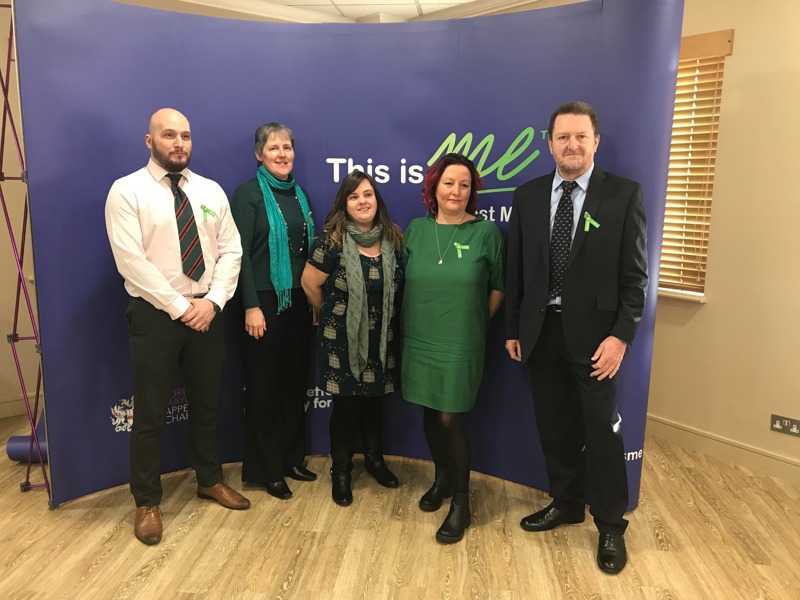 Amey employees stood in front of a 'this is me' banner stand.