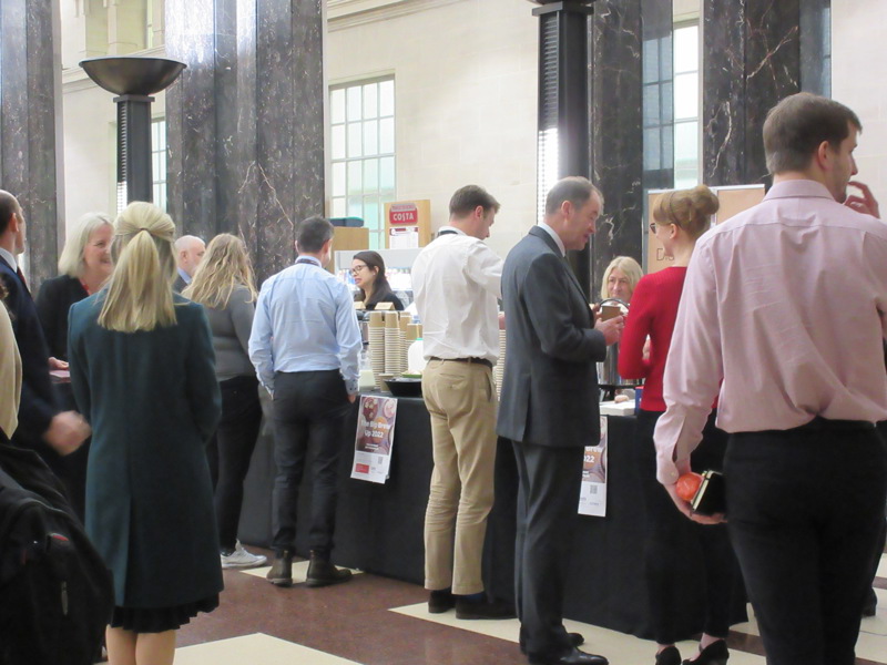 Image of people at a café stand.