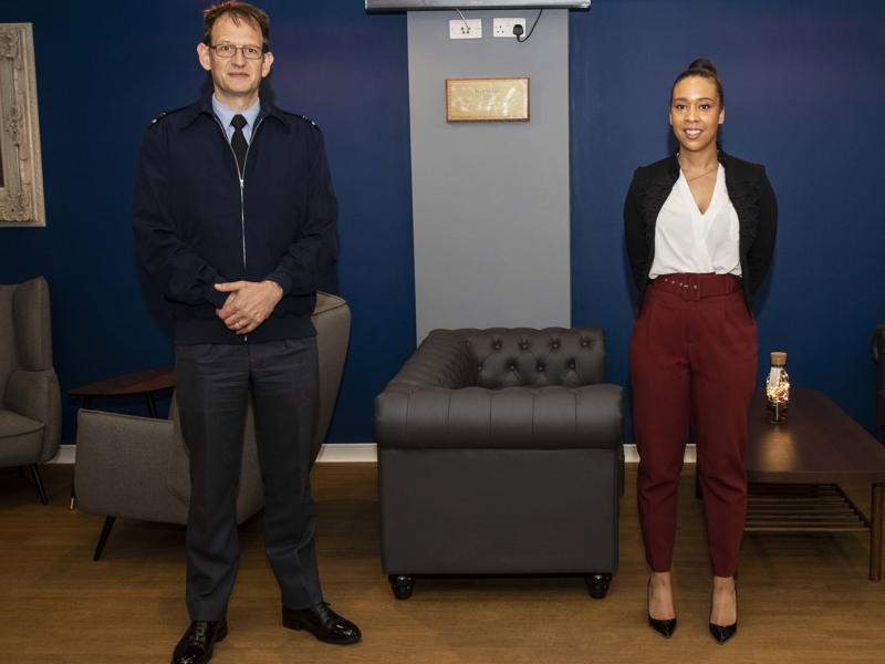 Image of two Amey employees attending the official opening of the new JE facility.