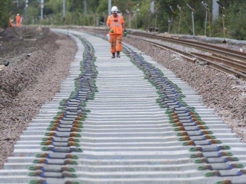Image of a worker on a rail track.