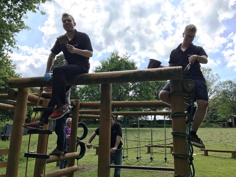 Image of Amey employees maintaining a children's park.