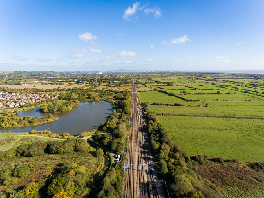 Ariel image of a rail track in the country side.