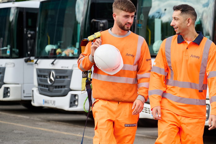 Image of two Amey employees in PPE