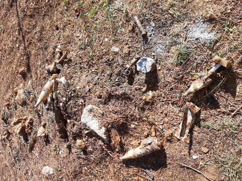 WW2 shell remains in the earth.