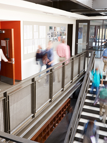 Image of a busy school corridor.