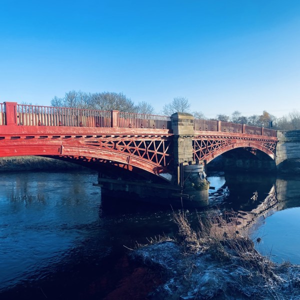 Image of a foot bridge over water.