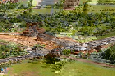 Ariel view of a roadside construction site.