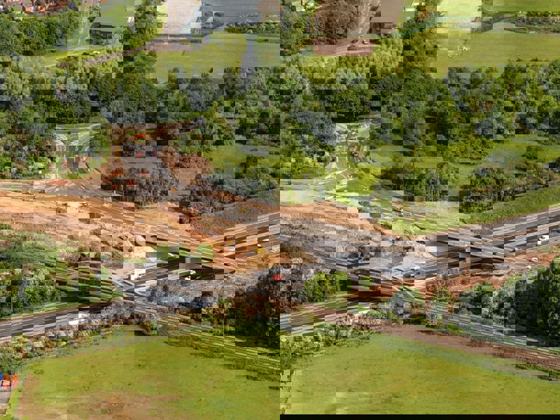 Ariel view of a roadside construction site.