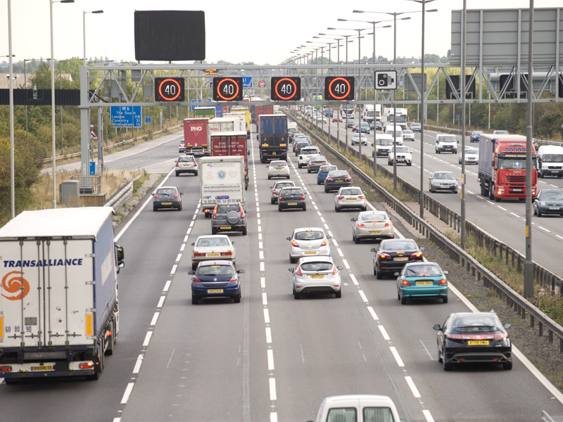 Image of a busy four lane highway.